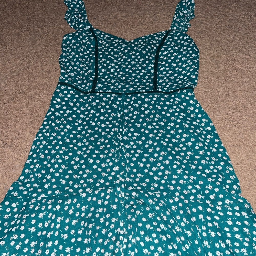 Emerald green and white floral dress with ruffled sleeves and tie in front